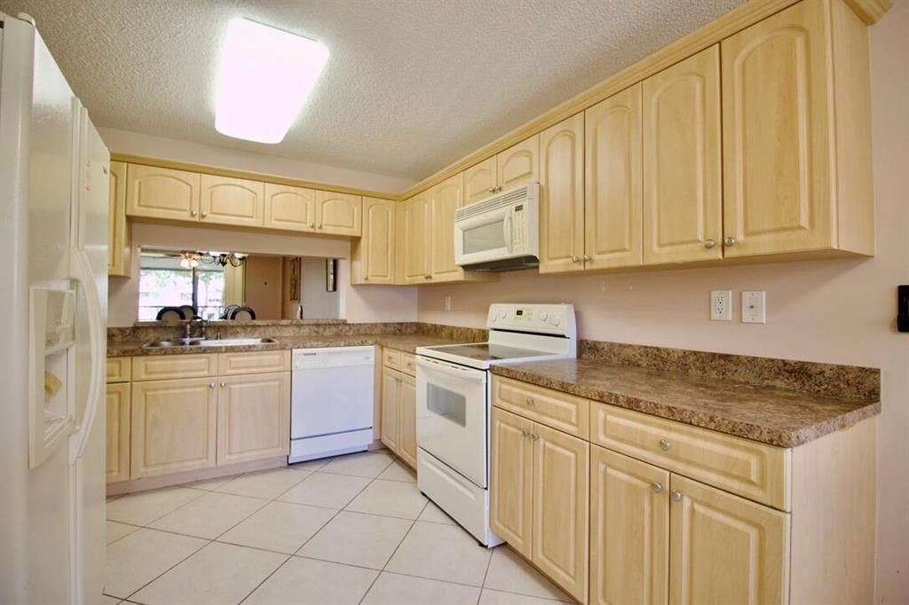 WATERSEDGE AT THE LAKES OF DELRAY CONDO A THRU H D - Residential