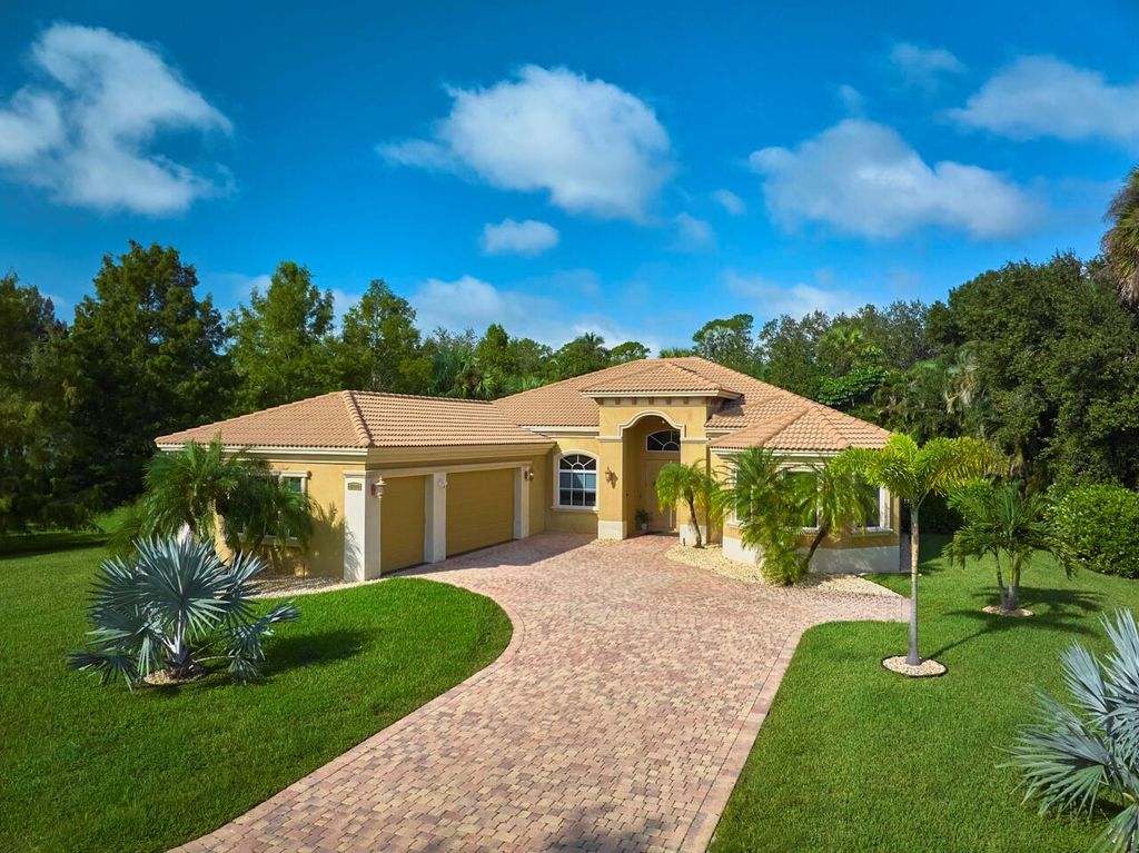 Photo of 8300 SW Cattleya Drive, Stuart, FL 34997 (MLS # R11130537)