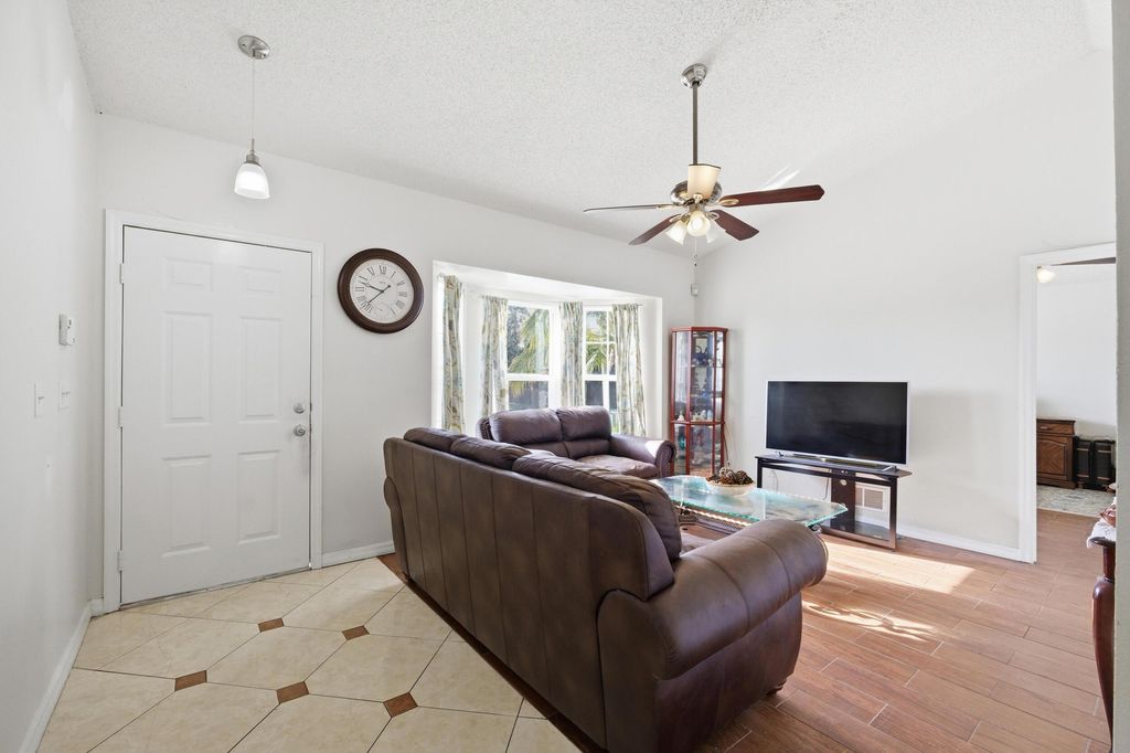 Photo of 1273 SW Glastonberry Avenue, Port Saint Lucie, FL 34953 (MLS # R11134426)