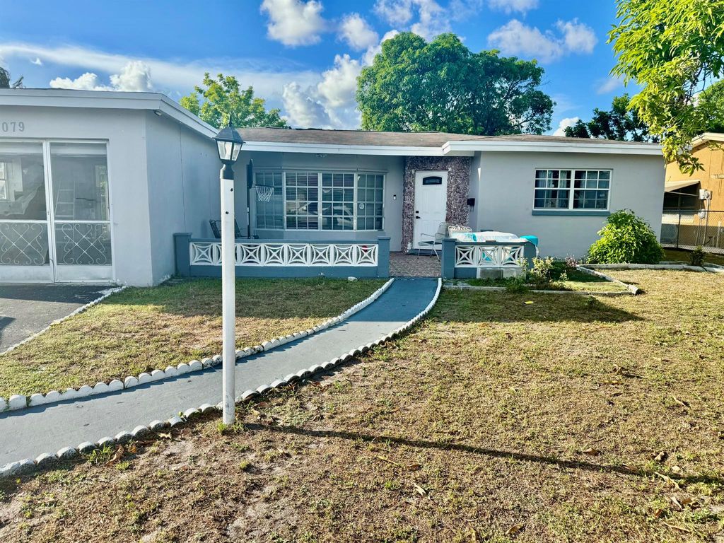Photo of 5079 NW 41 Court, Lauderdale Lakes, FL 33319 (MLS # R11104676)