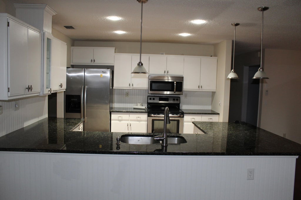 Photo of 13880 Paddock Drive, Wellington, FL 33414 (MLS # B26027815)