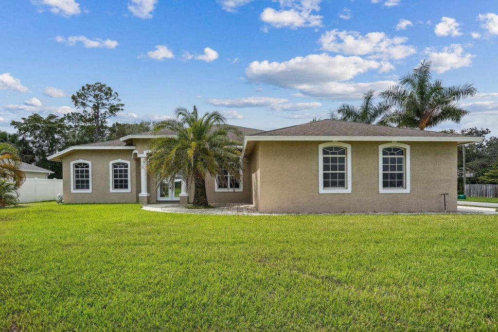 Photo of 2311 SW Vardon Street, Port Saint Lucie, FL 34953 (MLS # R10925748)