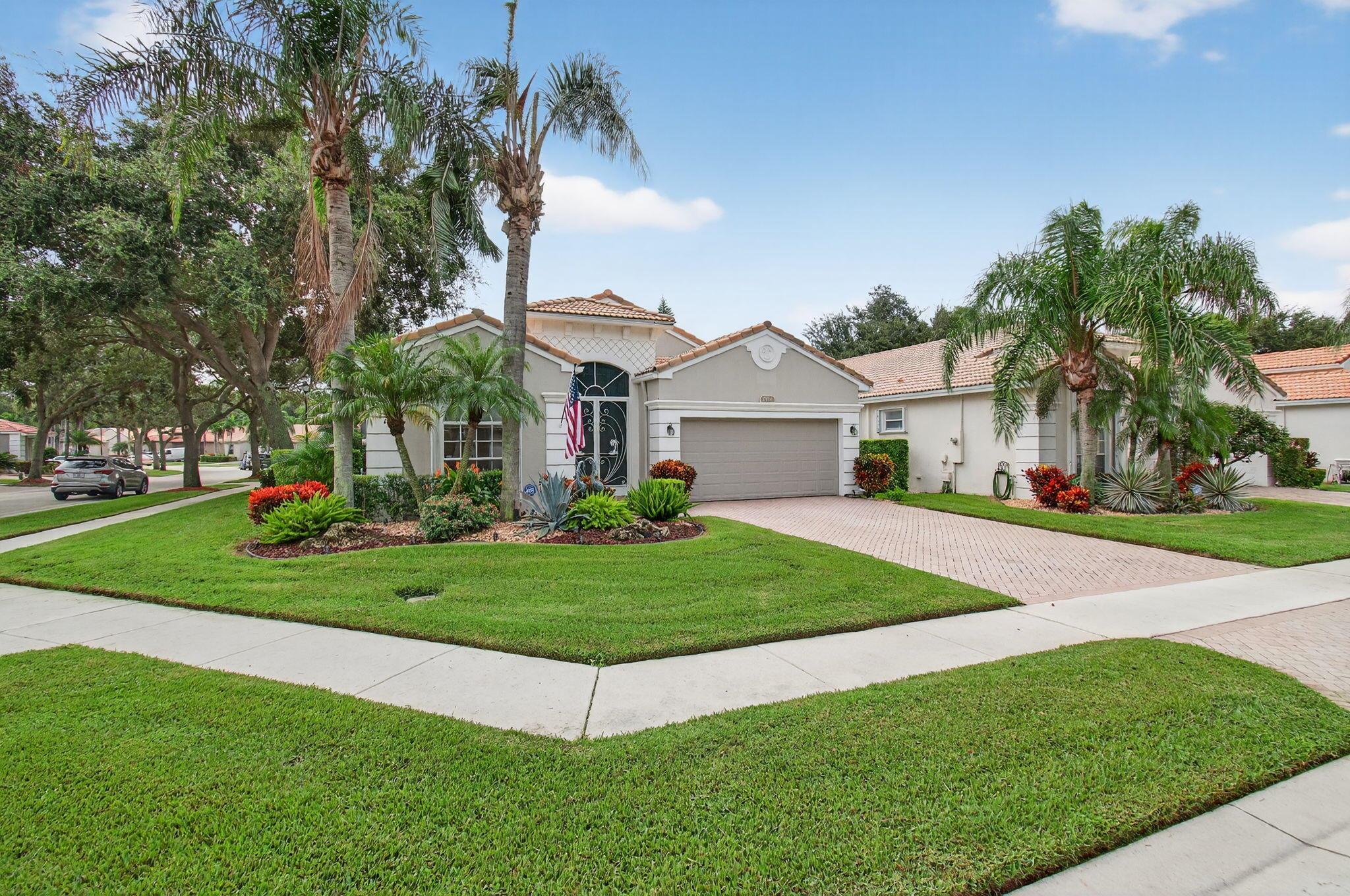 Immaculate Outstanding Ascot model with the wall down is a True 3BR/2BA with closets & doors in each BR. Seller leaving all outdoor patio furniture & updated grill for buyer. Upgrades galore include crown moldings throughout, updated kitchen w/all the bells & whistles. 36'' wood cabinets with auto close, w/granite counters, full backsplash, SS Appliances, SS Sink, Double Oven, large pantry, Eat in kitchen & more. Home complete with Accordion Hurricane Shutters & Whole house EC5 Series Water Treatment System by Rain Soft. Seller paid $11,395 for this premium water system. Home complete with Plantation Shutters, Fans & Fixtures throughout, neutral tile floor on diagonal in main living areas & laminate flooring in bedrooms. Transom above glass sliders in great room add lots of natural light