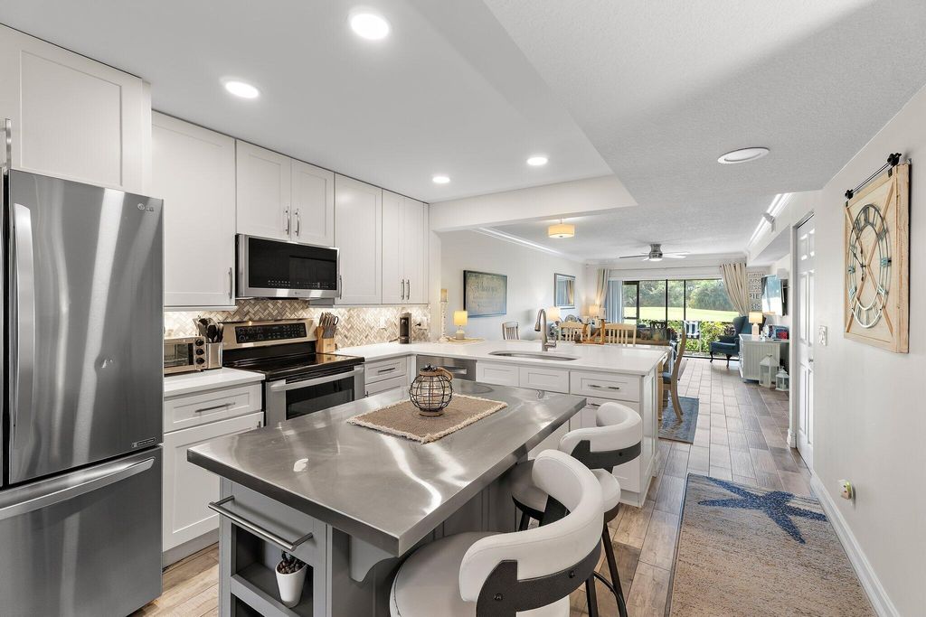 Photo of 1201 Pinecrest Circle #B, Jupiter, FL 33458 (MLS # R11134345)
