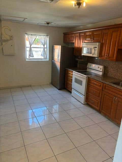 Photo of 681 SW 14TH Street, Deerfield Beach, FL 33441 (MLS # B26062084)