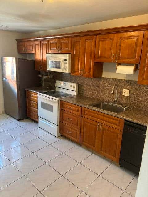 Photo of 681 SW 14TH Street, Deerfield Beach, FL 33441 (MLS # B26062084)
