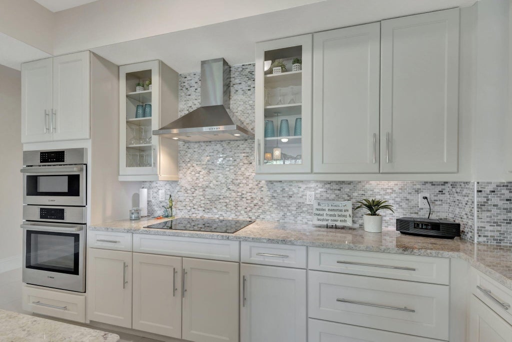Photo of 921 Bay Colony Drive S, Juno Beach, FL 33408 (MLS # R11057507)