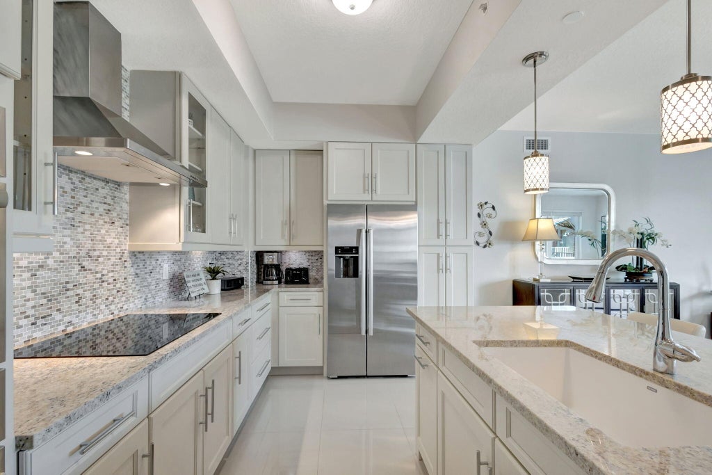 Photo of 921 Bay Colony Drive S, Juno Beach, FL 33408 (MLS # R11057507)