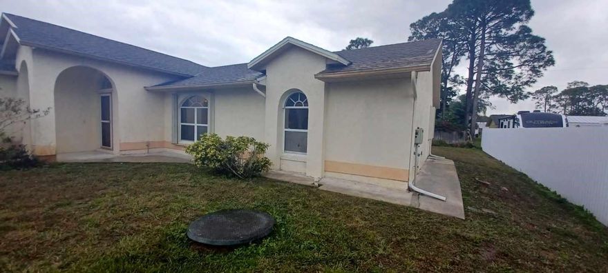 SPACIOUS 3/2 HOME IN PORT ST. LUCIE, FL WITH A 2 CAR GARAGE. GREAT FOR YOUR FIRST TIME BUYER OR INVESTOR.  EASY TO SHOW. TILE THROUGH OUT AND READY FOR YOU TO CUSTIMIZED TO YOUR OWN TASTE.