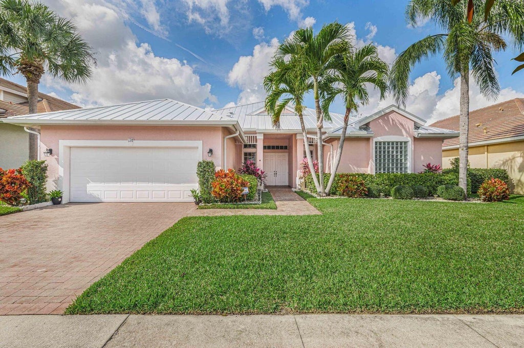 Photo of 137 NW Magnolia Lakes Boulevard, Port Saint Lucie, FL 34986 (MLS # B26021177)