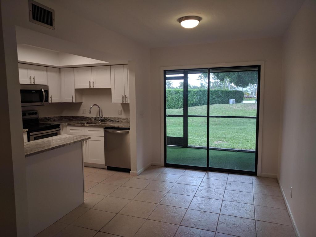 Photo of 4723 Oak Terrace Drive, Greenacres, FL 33463 (MLS # R11122208)