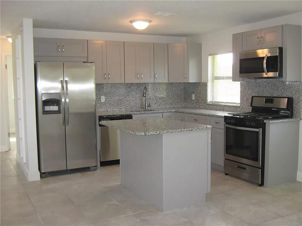 Photo of 113 Hilton Drive, Fort Pierce, FL 34946 (MLS # R10965503)