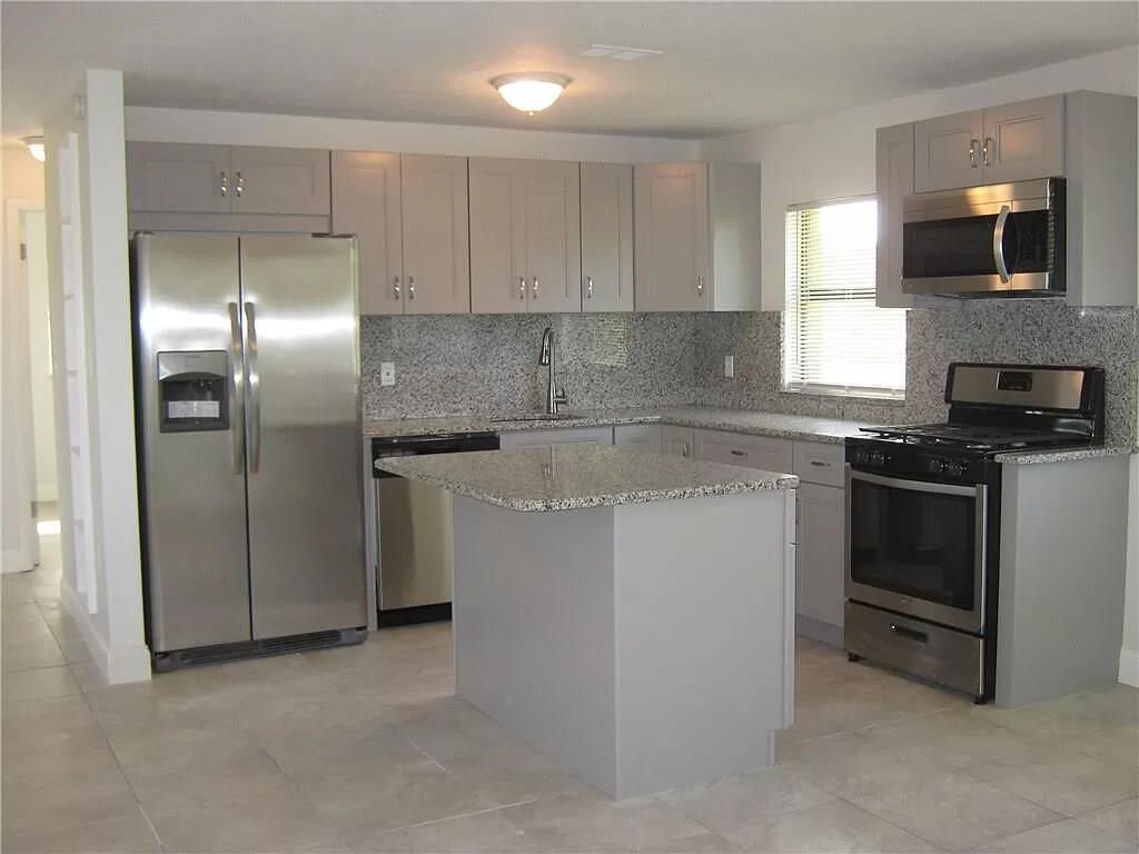 Photo of 113 Hilton Drive, Fort Pierce, FL 34946 (MLS # R10965503)