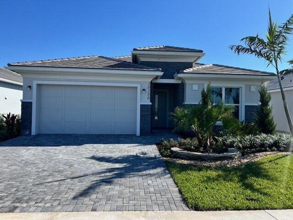 Photo of 10186 Timber Creek Way, Palm Beach Gardens, FL 33412 (MLS # B26017326)