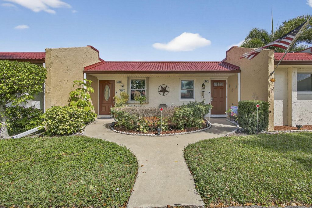 Photo of 441 Lake Helen Drive, West Palm Beach, FL 33411 (MLS # B26001775)