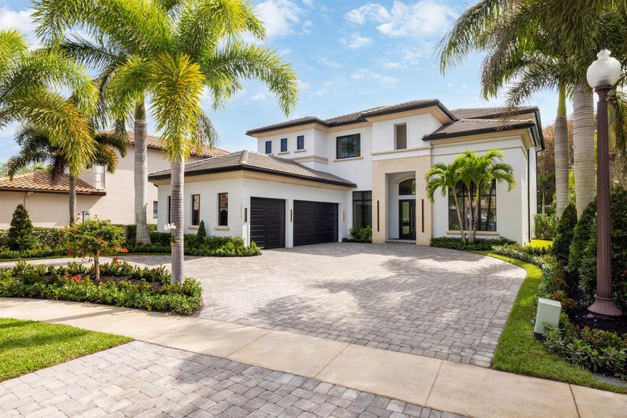 Nestled within the prestigious Oaks of Boca Raton, this extraordinary estate transcends mere property--it's a legacy in the making. Spanning an impressive 5,044 square feet, with a total of 6,877 square feet of luxurious living space, this residence is designed for those who appreciate the finer things in life. Step inside to discover five opulent bedrooms plus a dedicated office, perfectly complemented by a customized movie theater, where cinematic dreams come to life. Every corner of this home whispers sophistication, adorned with 13 exquisite slabs of imported Italian marble and meticulously crafted white oak millwork. The gourmet kitchen is a chef's dream, featuring a Wolf gas range and Sub Zero appliances, ensuring that every culinary endeavor is a delight.