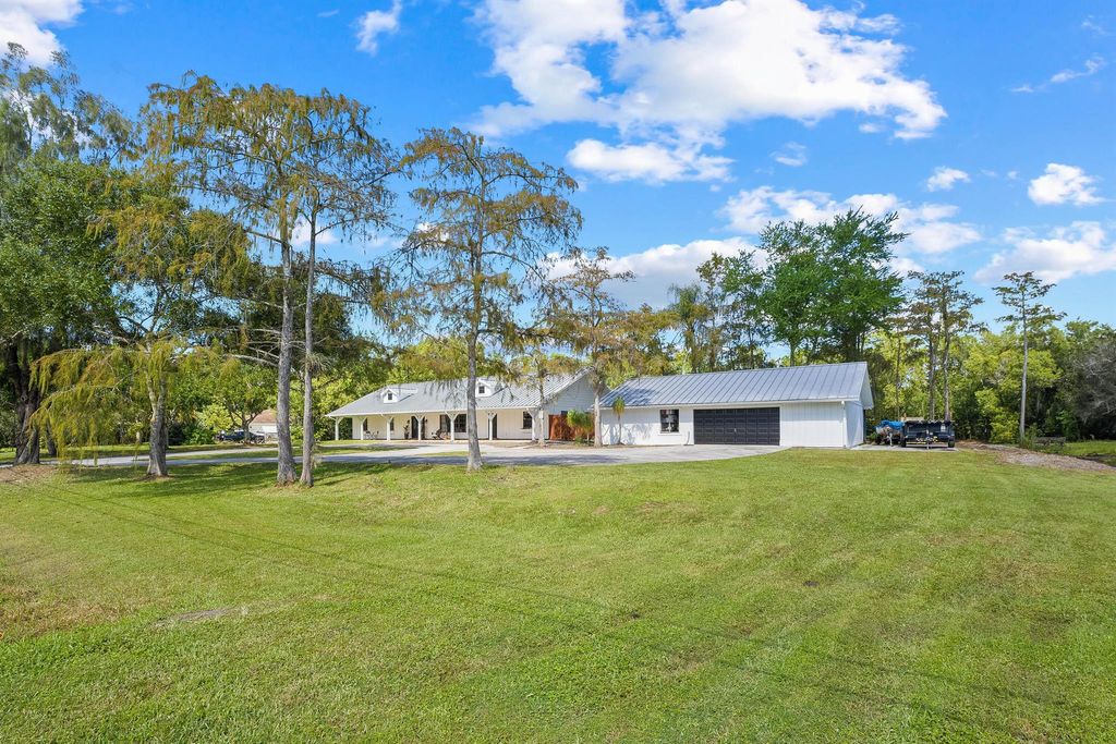 Photo of 10343 153rd Court N, Jupiter, FL 33478 (MLS # R10930591)