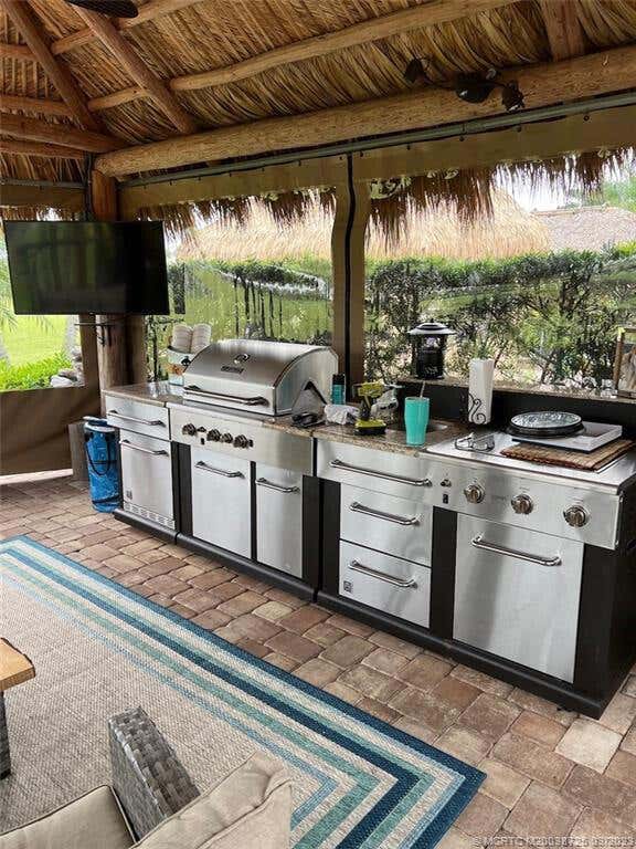 Photo of 319 NW CHIPSHOT Lane, Port Saint Lucie, FL 34986 (MLS # B26061854)
