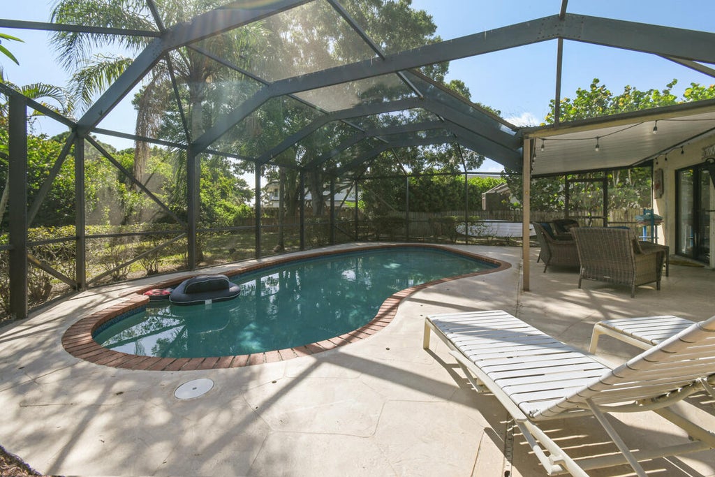 Photo of 4440 Colette Drive, Tequesta, FL 33469 (MLS # R11003244)
