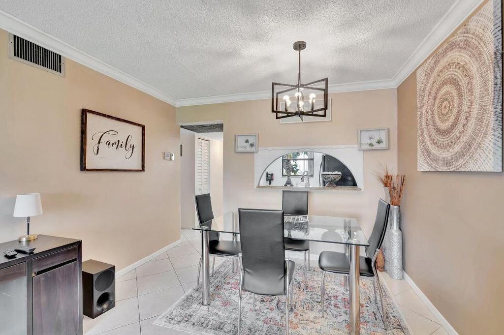 Photo of 7101 Golf Colony Court #102, Lake Worth, FL 33467 (MLS # R11095292)