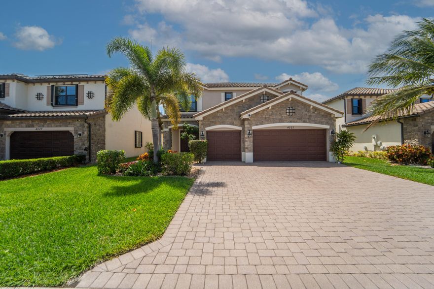 Set in a NEWER, PRESTIGIOUS GATED community, this RARE model stands out with stunning direct LAKE VIEWS and thoughtful MODERN upgrades throughout. Featuring 4 bedrooms, 4 bathrooms, and a 3-car garage, the home blends style and function with quartz countertops, porcelain tile, and a sleek, contemporary feel.  Enjoy RESORT-STYLE  amenities including a pool, clubhouse, and playground—plus the ease of HOA-covered yard maintenance. With GREAT SCHOOLS nearby and quick access to everyday conveniences, this one checks all the boxes. Come see it for yourself. Vacant, easy to show.