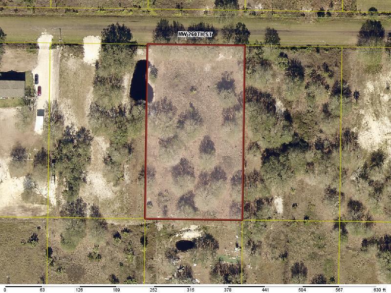 Build or bring your dream home and barn on this beautiful and private high and dry 1.25 acre just off the main paved road. There is so much to enjoy in Okeechobee County. Come to The Kissimmee River Preserve State Park West of this area as well is the Kissimmee River. The Kissimmee River flows into Lake Okeechobee and is well known for some of the best fishing. whether you like Fishing, hunting, mudding agriculture or just privacy here you have it all.