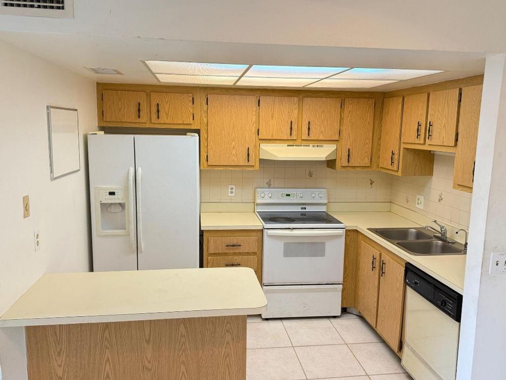 Photo of 4239 Oak Terrace Drive, Greenacres, FL 33463 (MLS # R11148665)