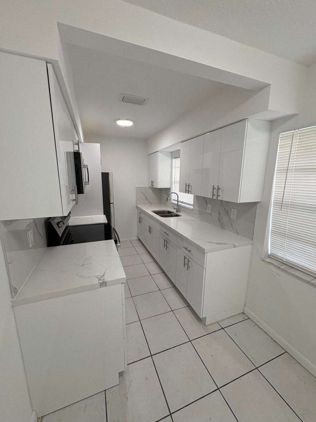 Photo of 4031 NW 30th Terrace #1, Lauderdale Lakes, FL 33309 (MLS # B26035318)