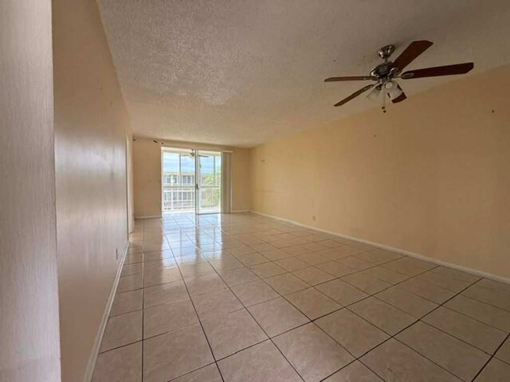 Photo of 6005 Del Lago Circle, Sunrise, FL 33313 (MLS # B26043226)