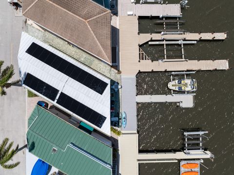 Photo of 392 Nettles Blvd, Jensen Beach, FL 34957 (MLS # F10504330)