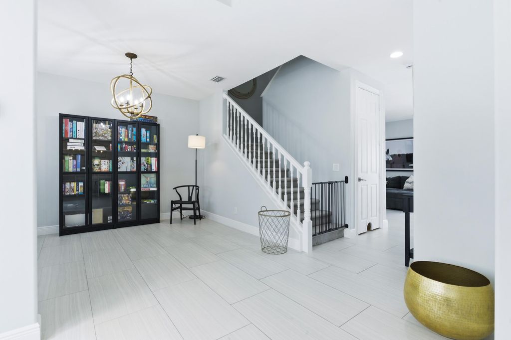 Photo of 573 Cocoplum Dr Drive E, Jupiter, FL 33458 (MLS # B26020637)