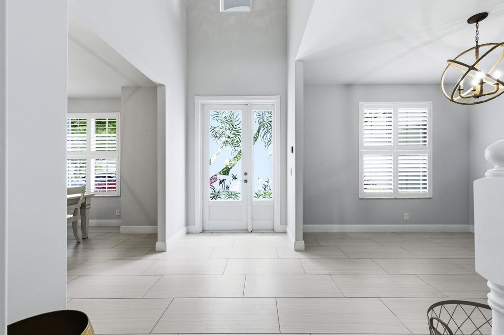 Photo of 573 Cocoplum Dr Drive E, Jupiter, FL 33458 (MLS # B26020637)