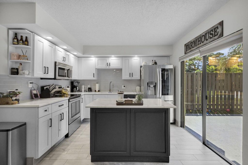 Photo of 1302 13 Court, Palm Beach Gardens, FL 33410 (MLS # R11095018)