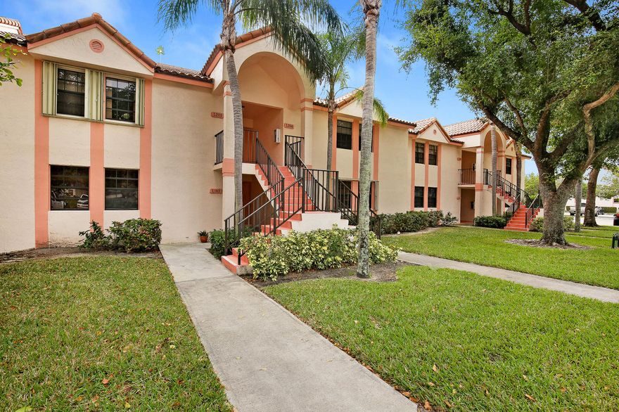 Light and Bright Renovated 3 Bedroom And 2 Bathroom Condo With Breathtaking Lake Views Located In The Heart Of Boca Raton!  This Freshly Painted Home Features A Remodeled Kitchen With New Quartz Countertops, White Shaker Cabinets, Plank Ceramic Flooring, and Fixtures. New Bathroom Vanities, Hardware And Fixtures Haven Been Installed.  5” Hardwood Baseboard Throughout The Home.  New High-End Mohawk Carpet Installed In The Two Guest Bedrooms, Tile Flooring In The Main Living Area,  Washer And Dyer In-Unit, Lake View Balcony Access From The Master Bedroom And Main Living Area.  Windwood Is A Guard Gated Community That Investors Can Rent Right Away And Offers Two Private Pools, Tennis Courts, Basketball Courts, Two Clubhouses and More.  Pet Friendly.  The Location Is Only A Few Miles To Mizner Light and Bright Renovated 3 Bedroom And 2 Bathroom Condo With Breathtaking Lake Views Located In The Heart Of Boca Raton!  This Freshly Painted Home Features A Remodeled Kitchen With New Quartz Countertops, White Shaker Cabinets, Plank Ceramic Flooring, and Fixtures. New Bathroom Vanities, Hardware And Fixtures Haven Been Installed.  5" Hardwood Baseboard Throughout The Home.  New High-End Mohawk Carpet Installed In The Two Guest Bedrooms, Tile Flooring In The Main Living Area,  Washer And Dyer In-Unit, Lake View Balcony Access From The Master Bedroom And Main Living Area.  Windwood Is A Guard Gated Community That Investors Can Rent Right Away And Offers Two Private Pools, Tennis Courts, Basketball Courts, Two Clubhouses and More.  Pet Friendly.  The Location Is Only A Few Miles To Mizner Park, FAU, Lynn University, I-95 All The City Of Boca Raton Has to Offer.