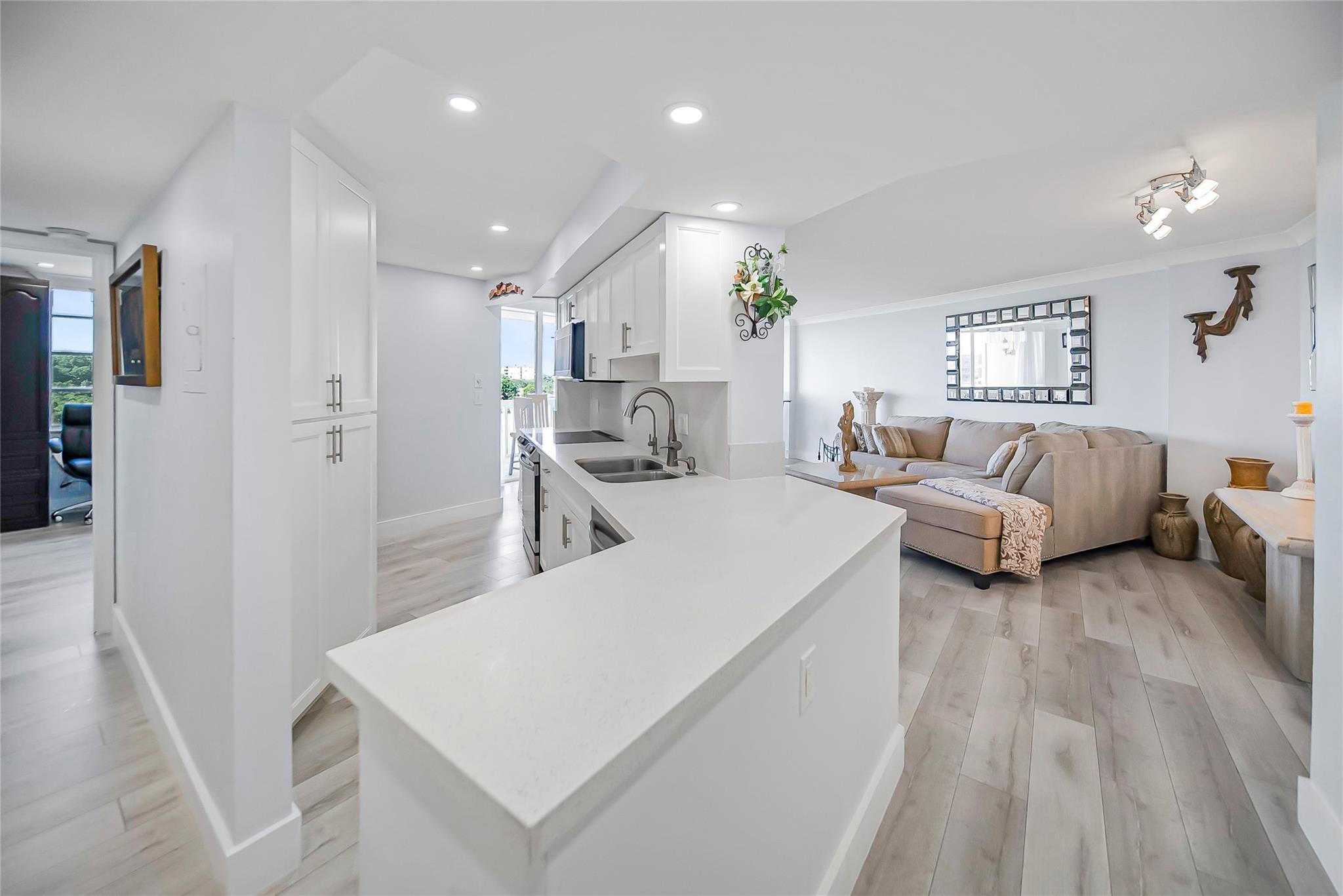 Welcome to the Château @Environ, located on the 5th floor this unit offers extensive views of the North Eastern Broward skyline. This uniquely constructed, freshly renovated 2-bedroon, 2-bathroom is an easy commute to the beaches, malls, shops, restaurants, places of entertainment & more. The community boasts two pools on site in addition a large community center with tons of amenities, gyms, basketball court, tennis courts, pickle ball court, pool, pool tables, air hocky table, bowling alley and more free of any additional charges. This unit is offered fully furnished, just bring your clothes and tooth brush. Power, water, cable, internet, and all amenities are included in the rent. This is a gated community.