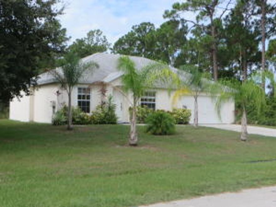 2005 Light and Bright, Well Maintained Home!  Move in Condition, 3/2/2 Split Bedroom. Spacious Living Room/Dining Area with Cathedral Ceilings. New A/C, Includes All Appliances and Ceiling Fans Throughout. Large Screened Rear Porch Backs to Open Treed Acreage. Not a Short Sale or Foreclosure. Desirable Gatlin Area located near I-95, Tpke, Shopping, Tradition, and Mets Stadium. Cash/Conventional/FHA. A MUST SEE, WON'T LAST!