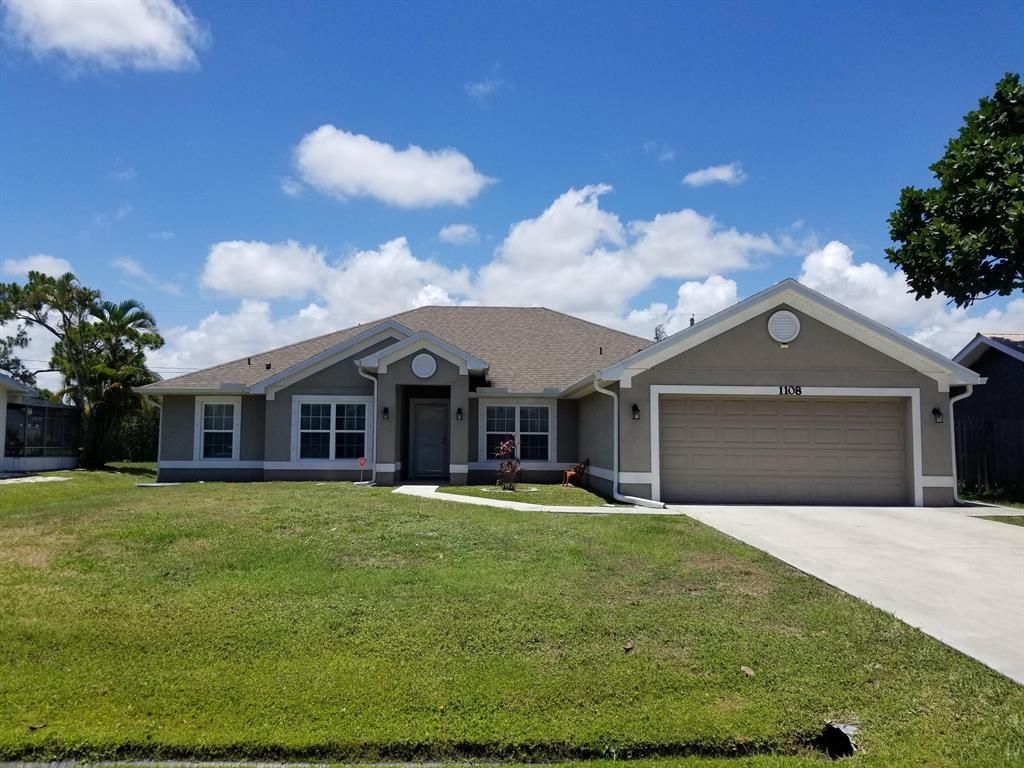Photo of 1108 SE Clifton Lane, Port Saint Lucie, FL 34983 (MLS # R10722827)