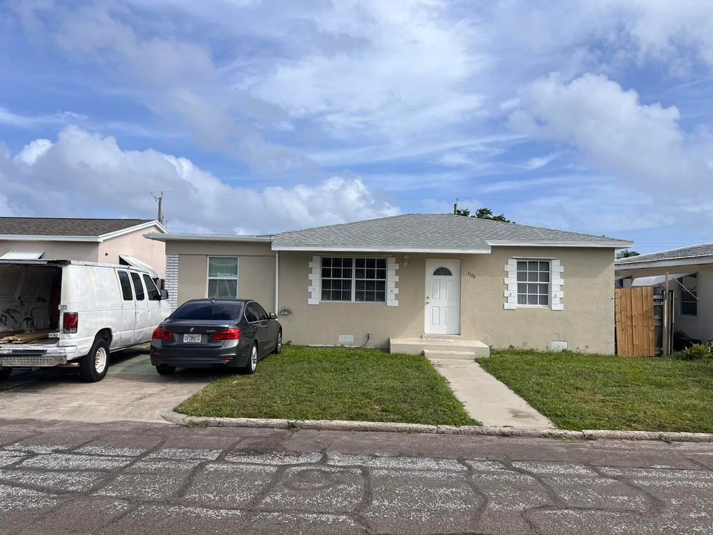 Photo of 1106 N C Street, Lake Worth Beach, FL 33460 (MLS # R11035438)