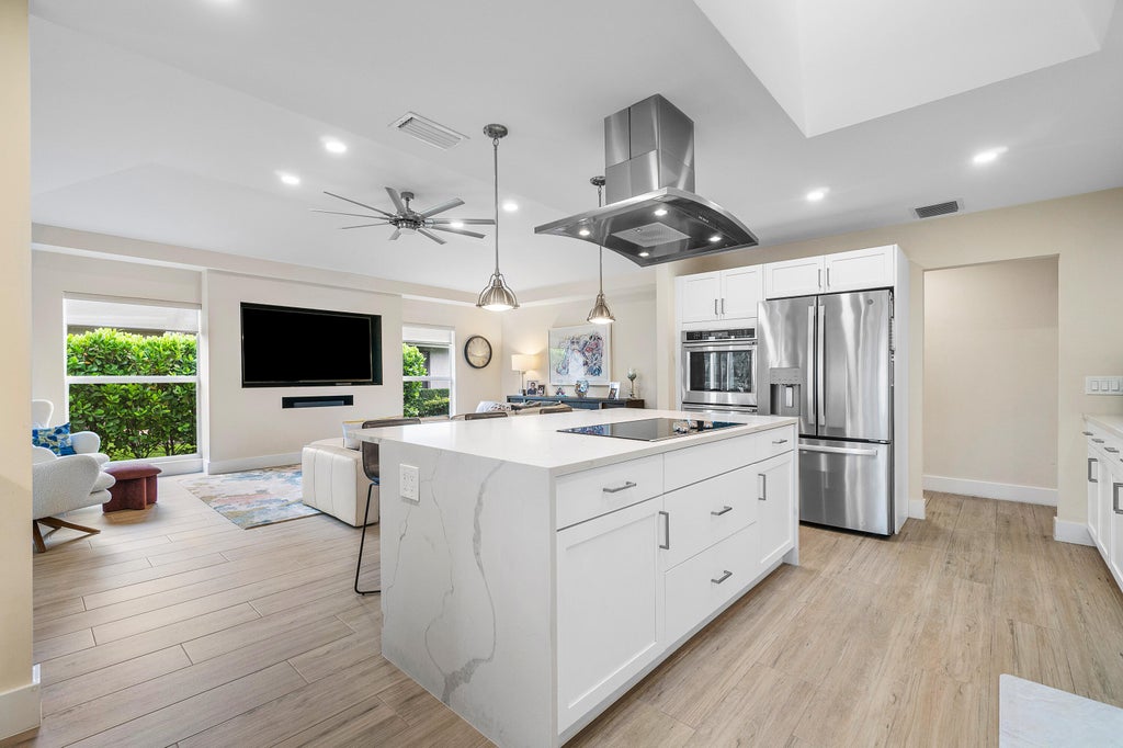 Photo of 13664 Crosspointe Drive, Palm Beach Gardens, FL 33418 (MLS # R11032629)
