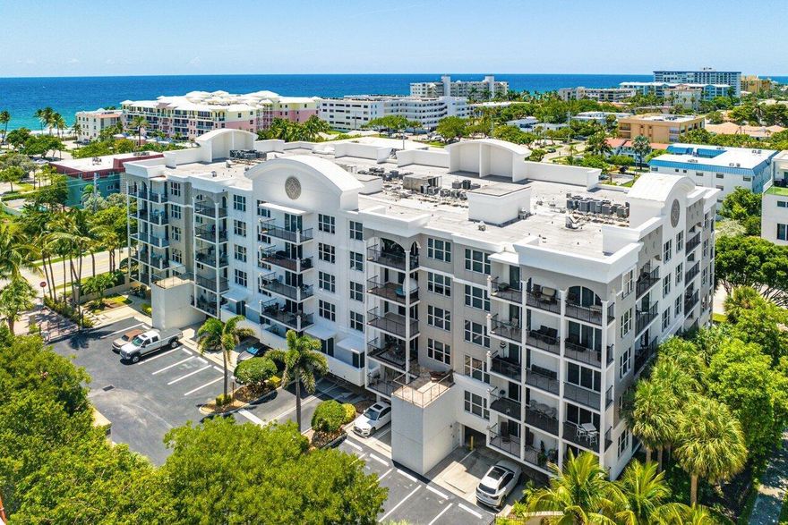 Deerfield premier condominium at 1 Ocean Blvd. This lower Southeast Penthouse corner condo features three full bedrooms, 2.5 baths and located in the heart of Downtown Deerfield. One block to the beaches or one block west to the intracoastal. Enjoy ocean views from the Master, living, family room and expansive double terrace. Upgrades throughout include a chef's kitchen with modern appliances, coastal design, laminated wood plank floors, his and her walk-in closets and master bath with dual sinks, jacuzzi and shower. Impact windows and sliding glass doors throughout. Community offers a private gate, pool, bbq and a gym. One deeded parking spot #158. New buyers can lease out the residence the first year of ownership. Two pets allowed. New building roof almost complete.
