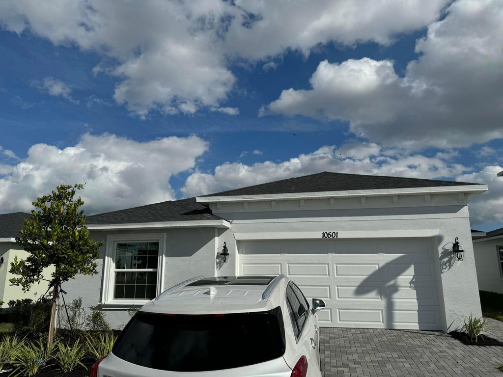 Photo of 10501 NW Suncrest Lp Loop, Port Saint Lucie, FL 34987 (MLS # R11146574)