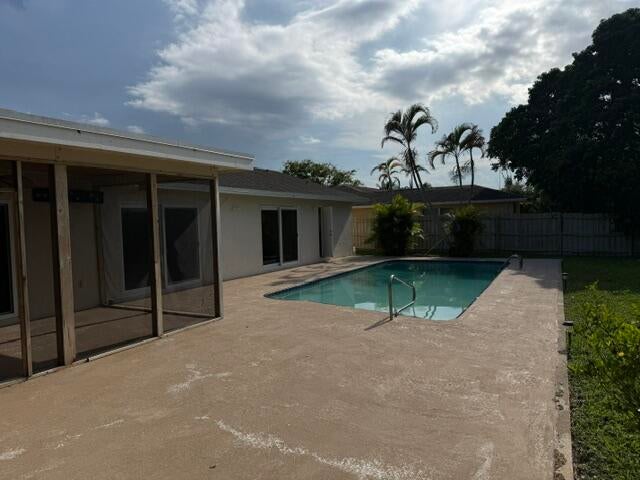 Photo of 113 Sandpiper Avenue, Royal Palm Beach, FL 33411 (MLS # B26038067)