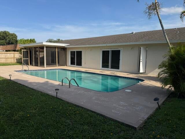 Photo of 113 Sandpiper Avenue, Royal Palm Beach, FL 33411 (MLS # B26038067)