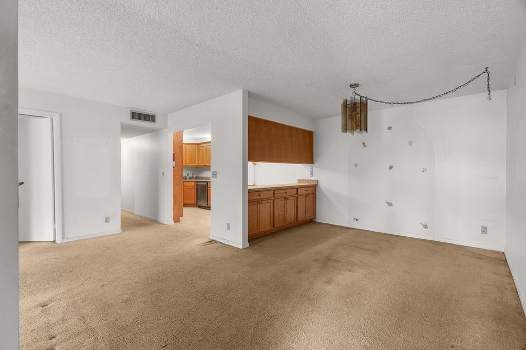 Photo of 713 Sunny Pine Way #G1, Greenacres, FL 33415 (MLS # B26031046)
