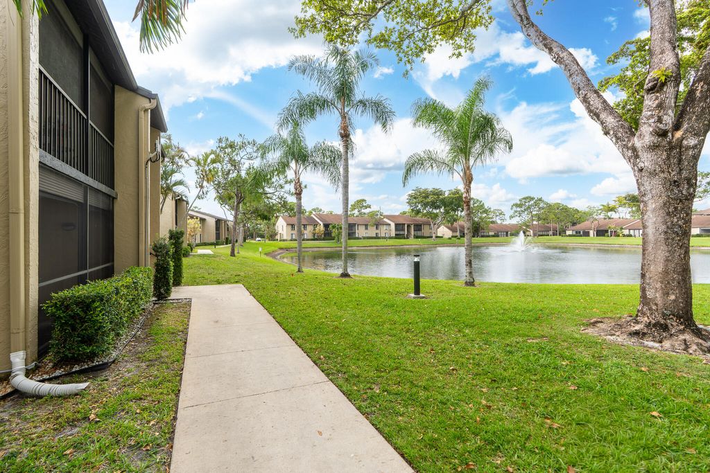 Photo of 713 Sunny Pine Way #G1, Greenacres, FL 33415 (MLS # B26031046)