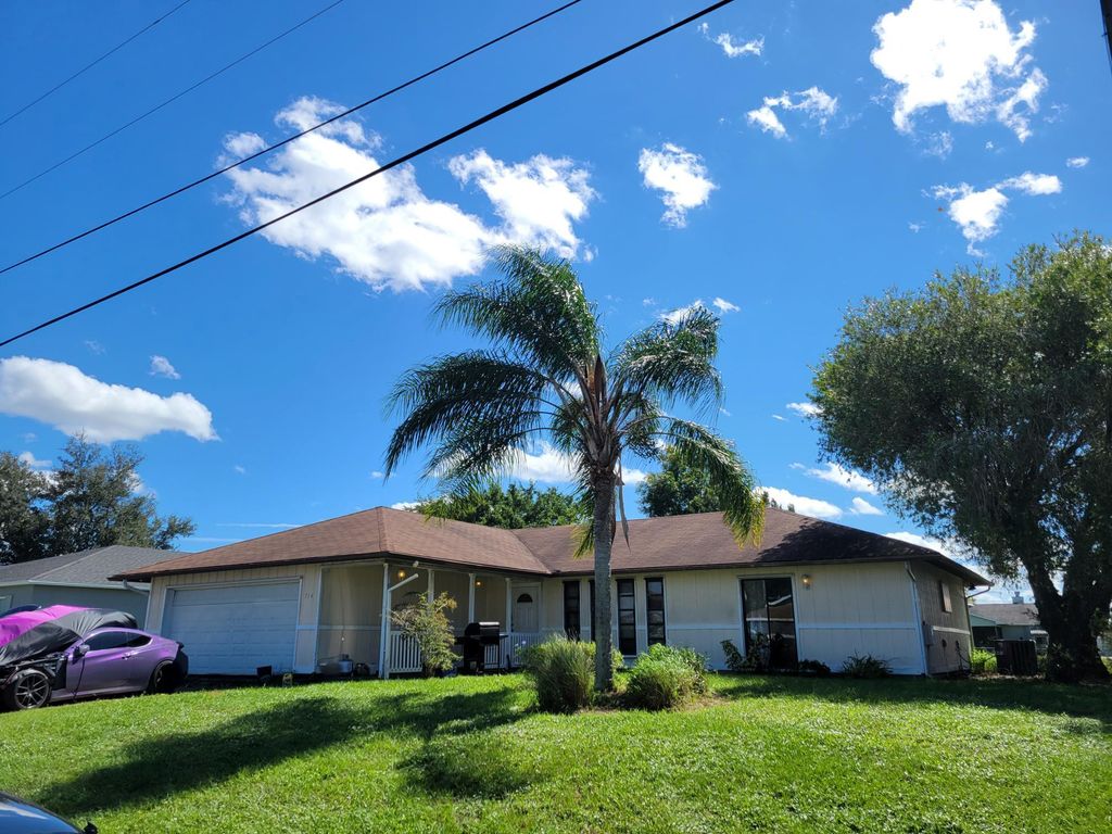 Photo of 714 SW Saragossa Avenue, Port St Lucie, FL 34953 (MLS # R10928327)