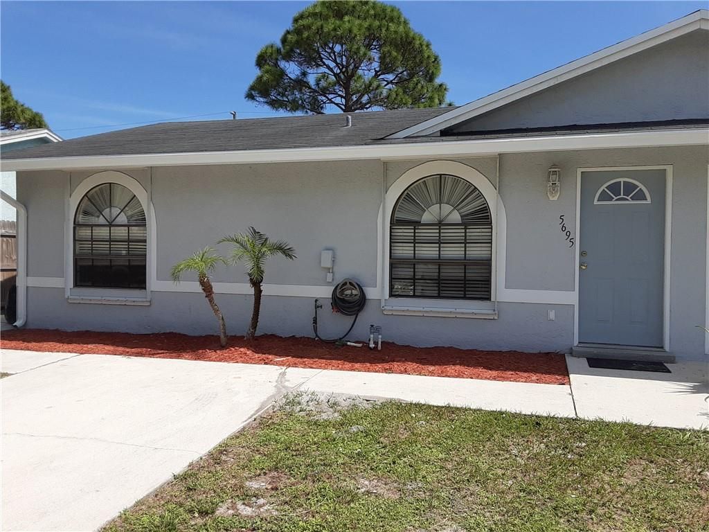 Photo of 5695 SE Tangerine Blvd #5695, Stuart, FL 34997 (MLS # F10308804)