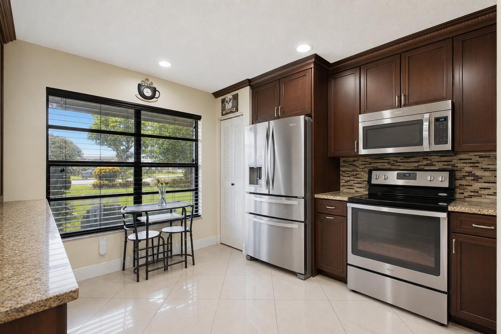 Photo of 1470 Summit Run Circle, West Palm Beach, FL 33415 (MLS # B26048916)