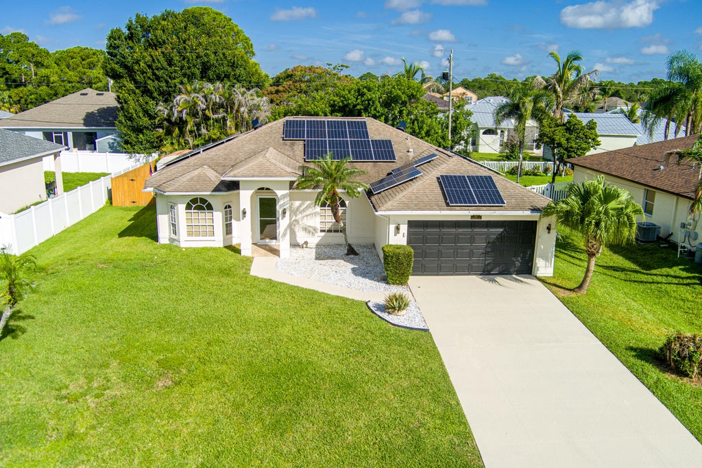 Photo of 1978 SW Hillman Street, Port Saint Lucie, FL 34953 (MLS # B26061469)
