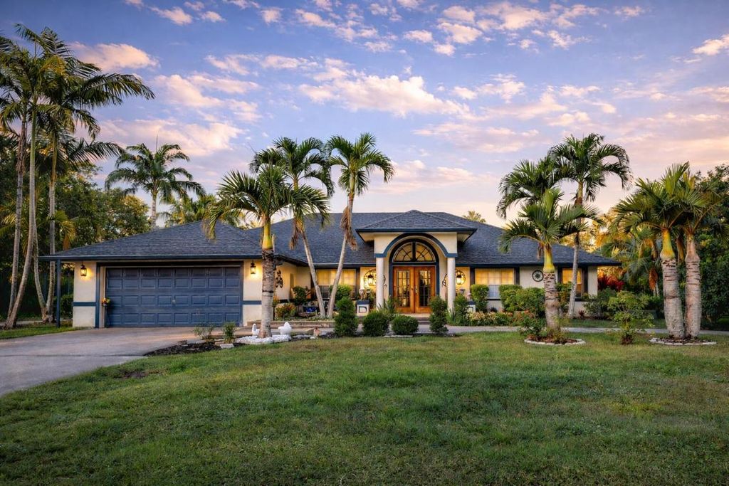 Photo of 12119 Orange Boulevard, Loxahatchee, FL 33470 (MLS # R11156256)